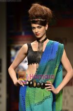 Model walks the ramp for Niki Mahajan show on Wills Lifestyle India Fashion Week 2011-Day 4 in Delhi on 9th April 2011 (147).JPG